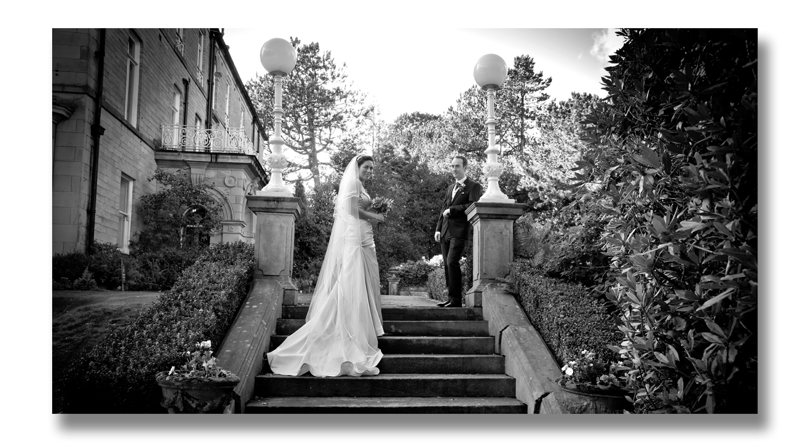 bride and groom on the steps